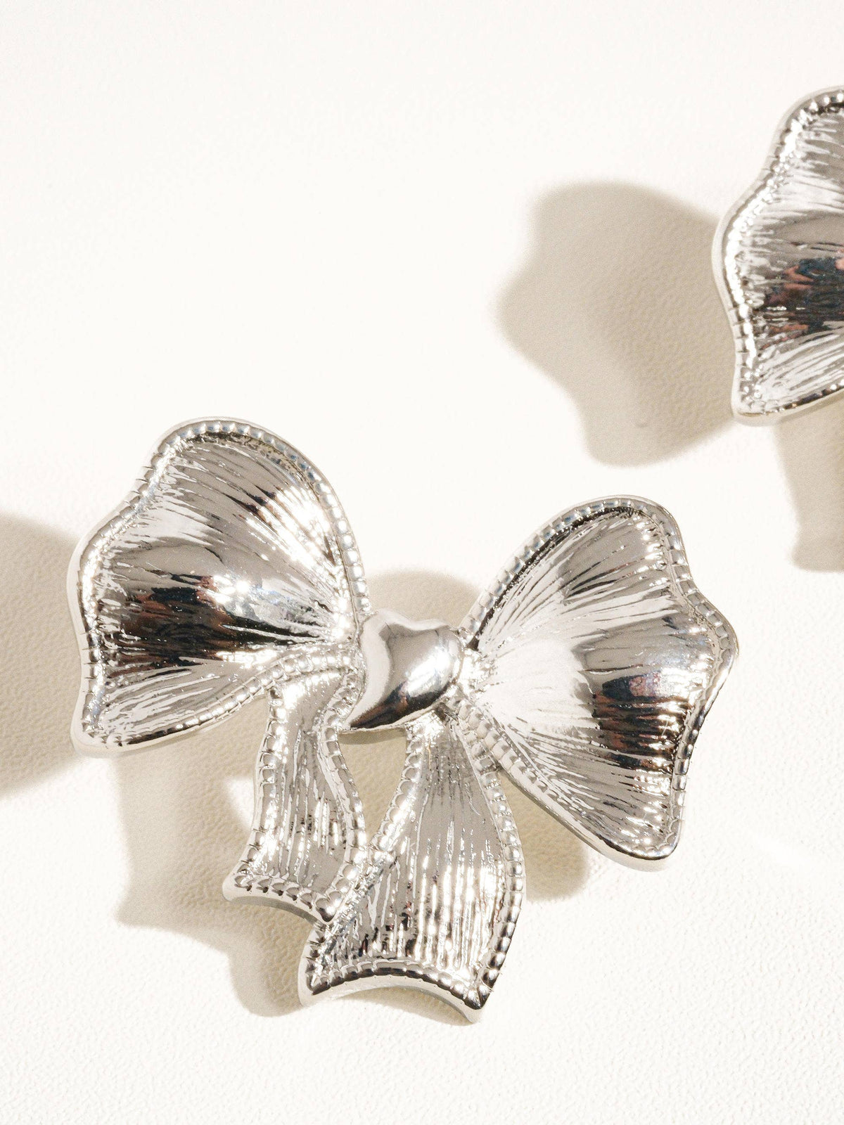 Glint Silver Glitter Bow Earring