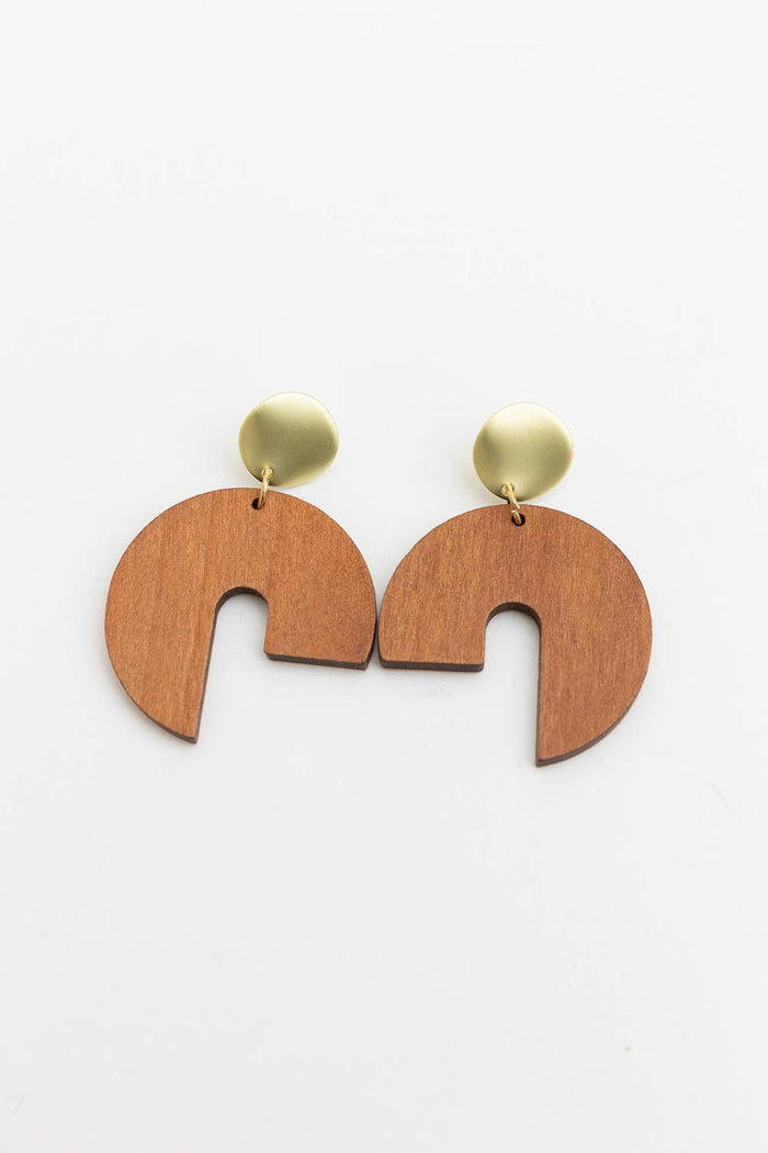 wooden modern arch shaped earrings on white background