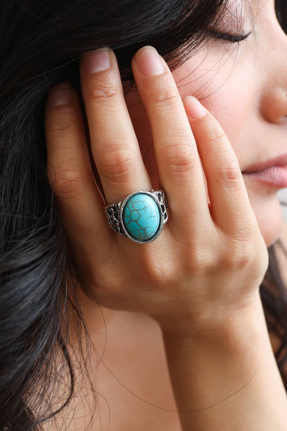 turquoise and silver ring on model