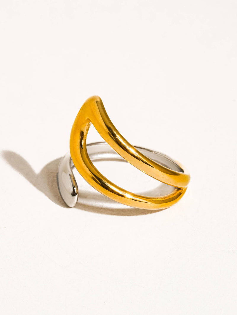 A two-tone adjustable ring featuring a sleek intertwining design, with contrasting polished silver and gold finishes for a modern aesthetic.